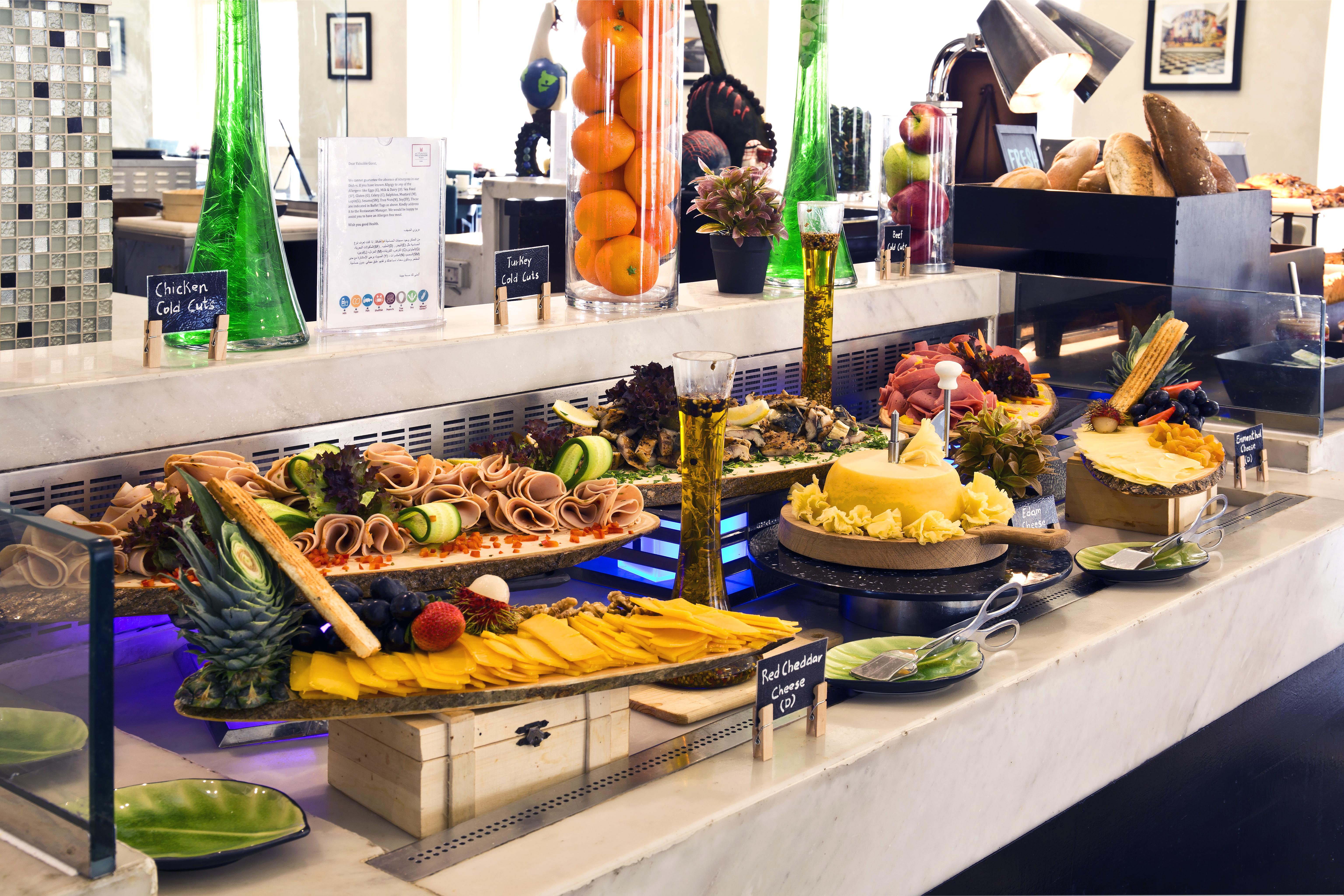 The Tower Plaza Hotel Dubai Buitenkant foto Buffet at a luxury hotel