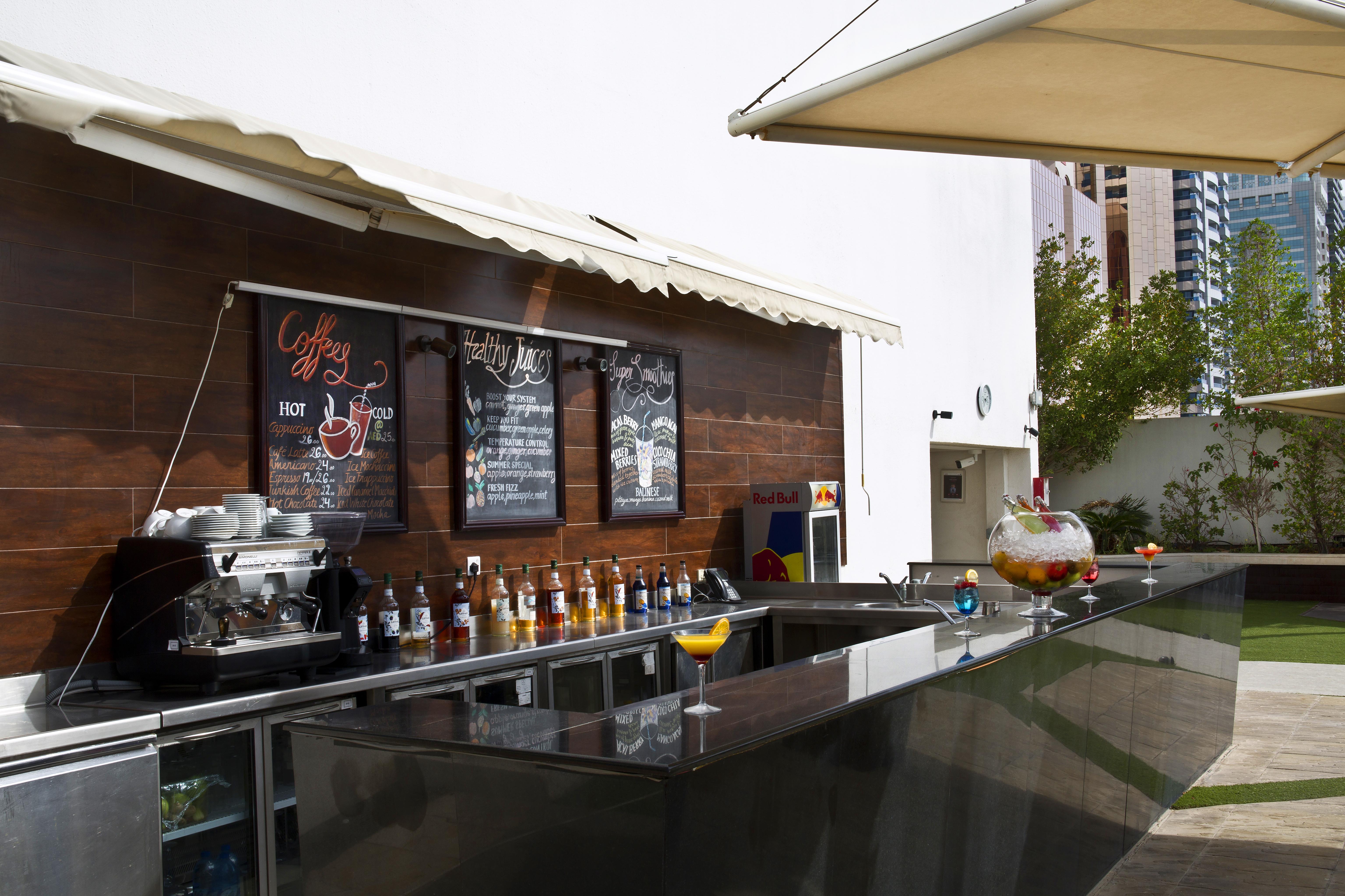 The Tower Plaza Hotel Dubai Buitenkant foto The Coffee Bar